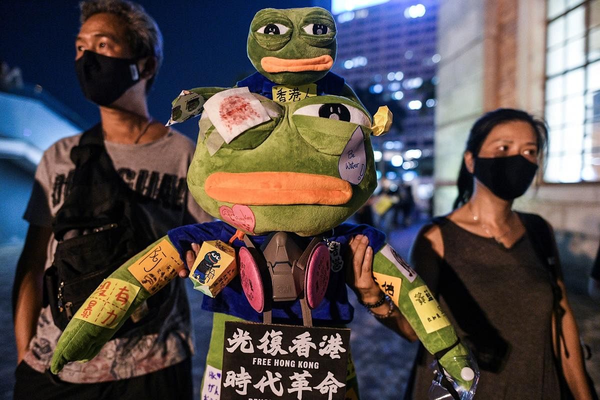 He may have become a far-right internet meme in the West, but Pepe the Frog's image is being rehabilitated in Hong Kong where democracy protesters have embraced him as an irreverent symbol of their resistance. (Photo by AFP)