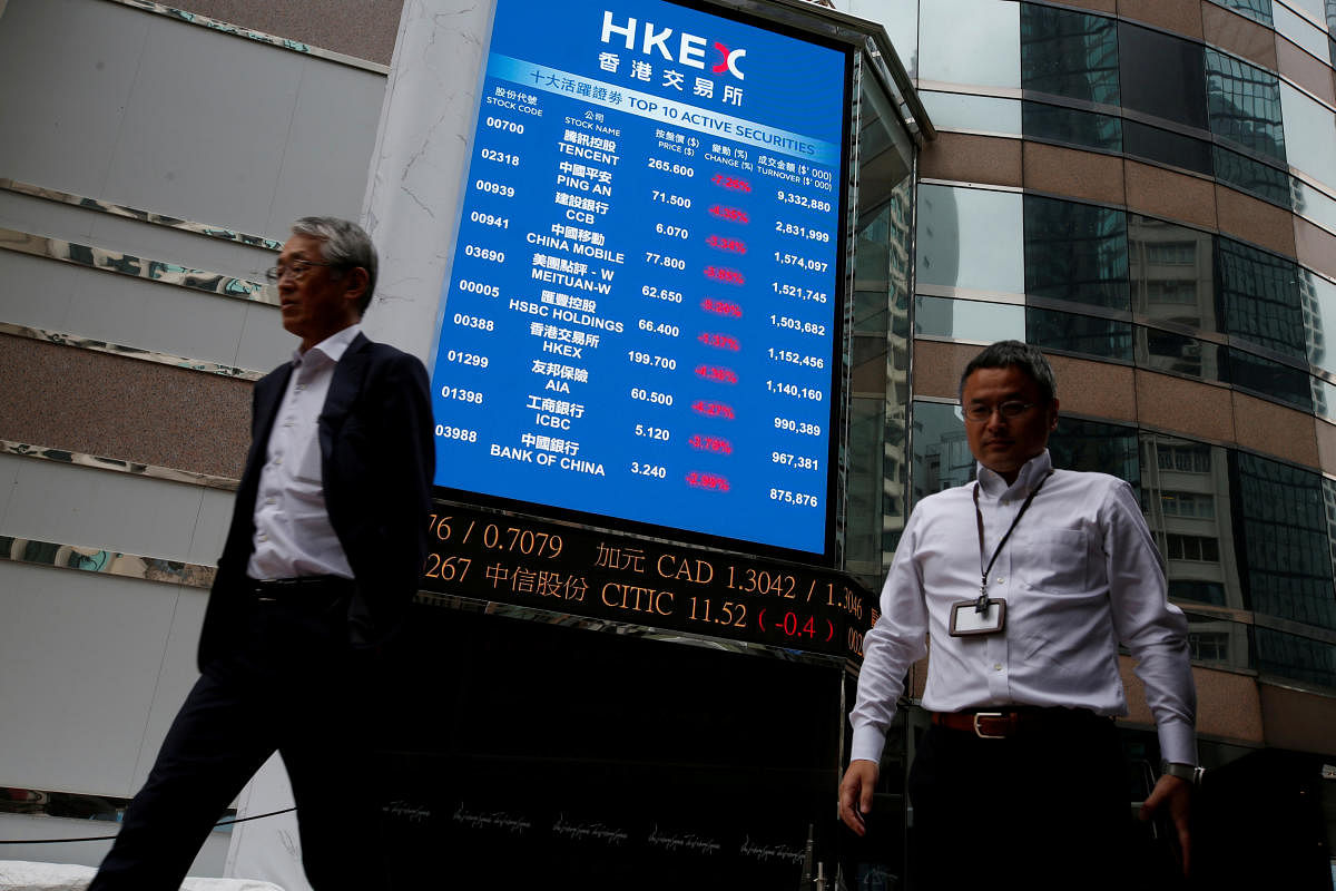 A panel outside the Hong Kong Exchanges displays top active securities during morning trading in Hong Kong, China October 11, 2018. (Reuters Photo)