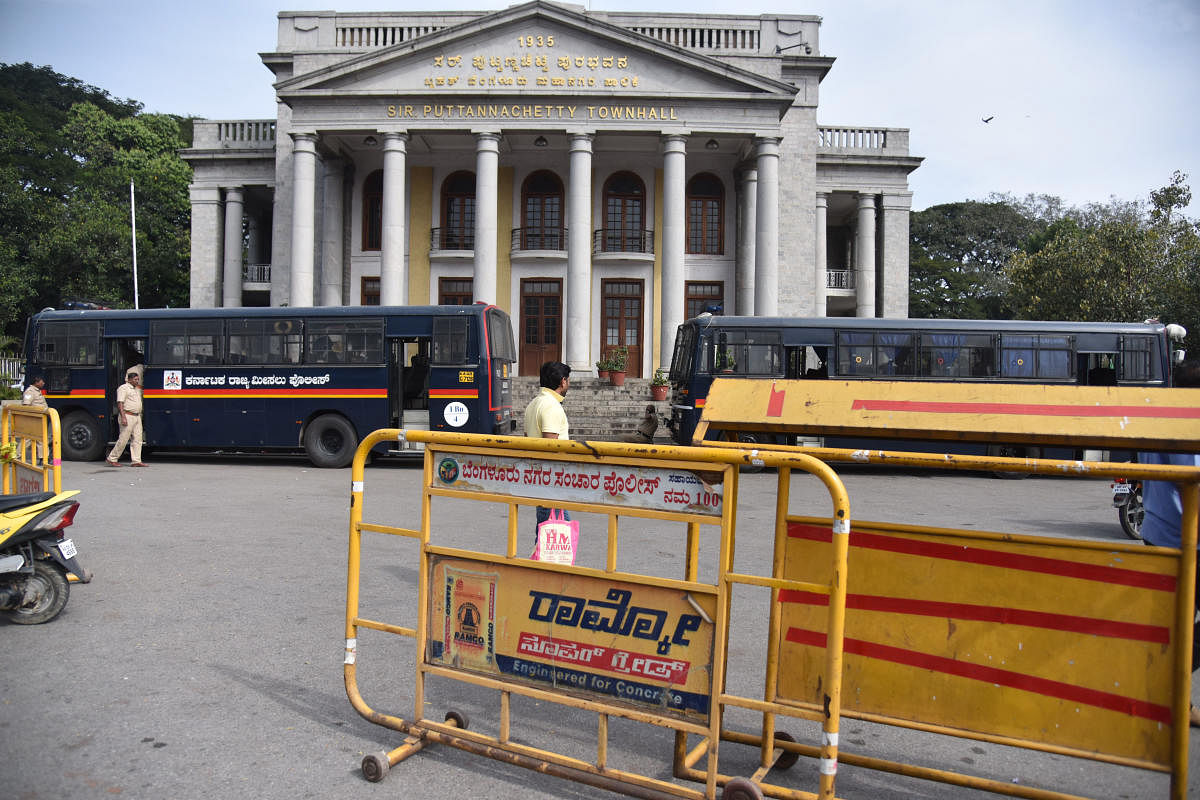 The barricades set up by the police outside Town Hall were not yet removed on Saturday. DH PHOTO/S K Dinesh