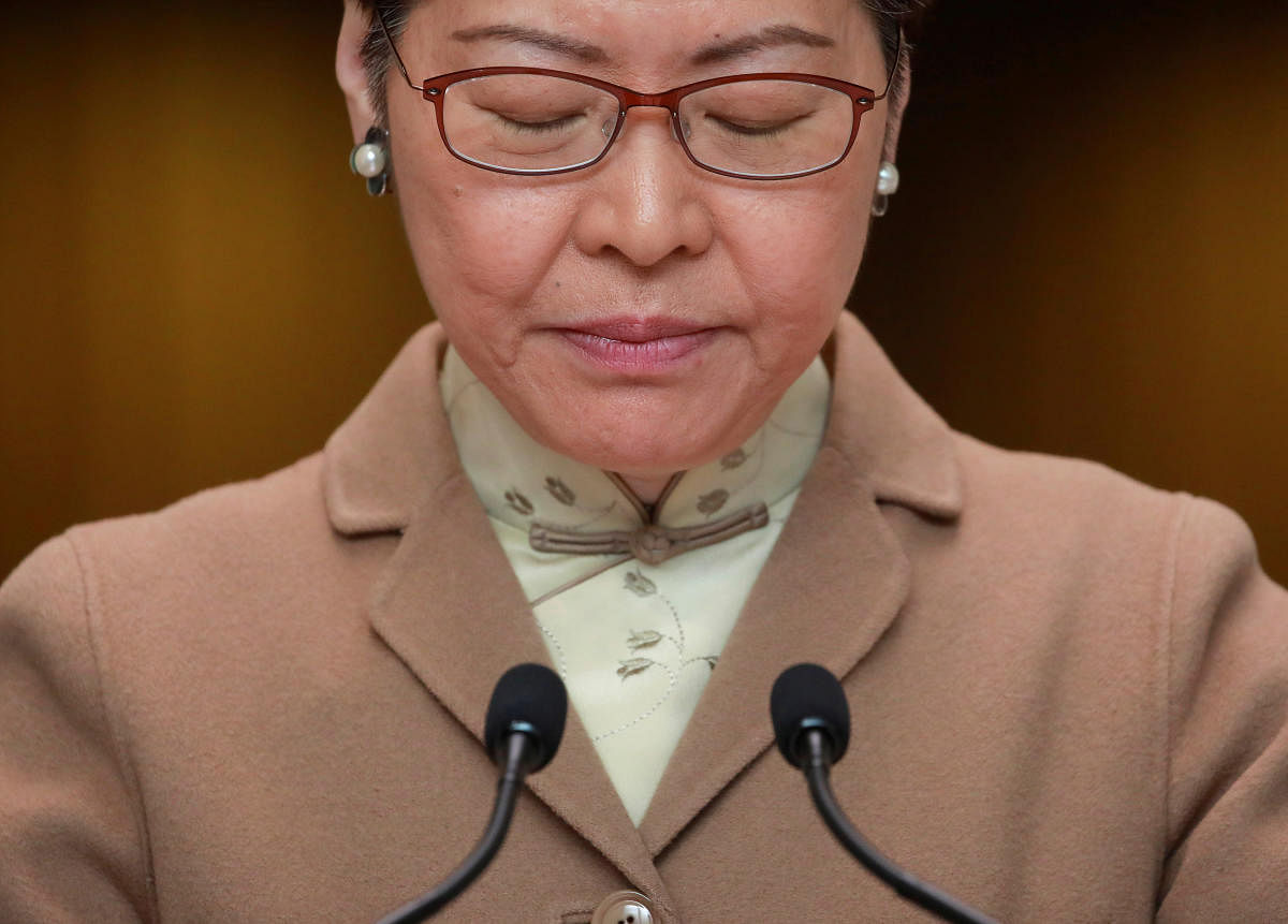Hong Kong Chief Executive Carrie Lam looks down as she attends a news conference in Hong Kong. (REUTERS photo)