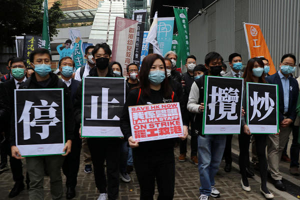 Winnie Yu, chairperson of the Hospital Authority Employees Alliance, walks with other members to the government headquarters to submit their petition demanding the government to close the border with mainland China following the outbreak of the new coronavirus, in Hong Kong, China February 5, 2020. (Reuters Photo)