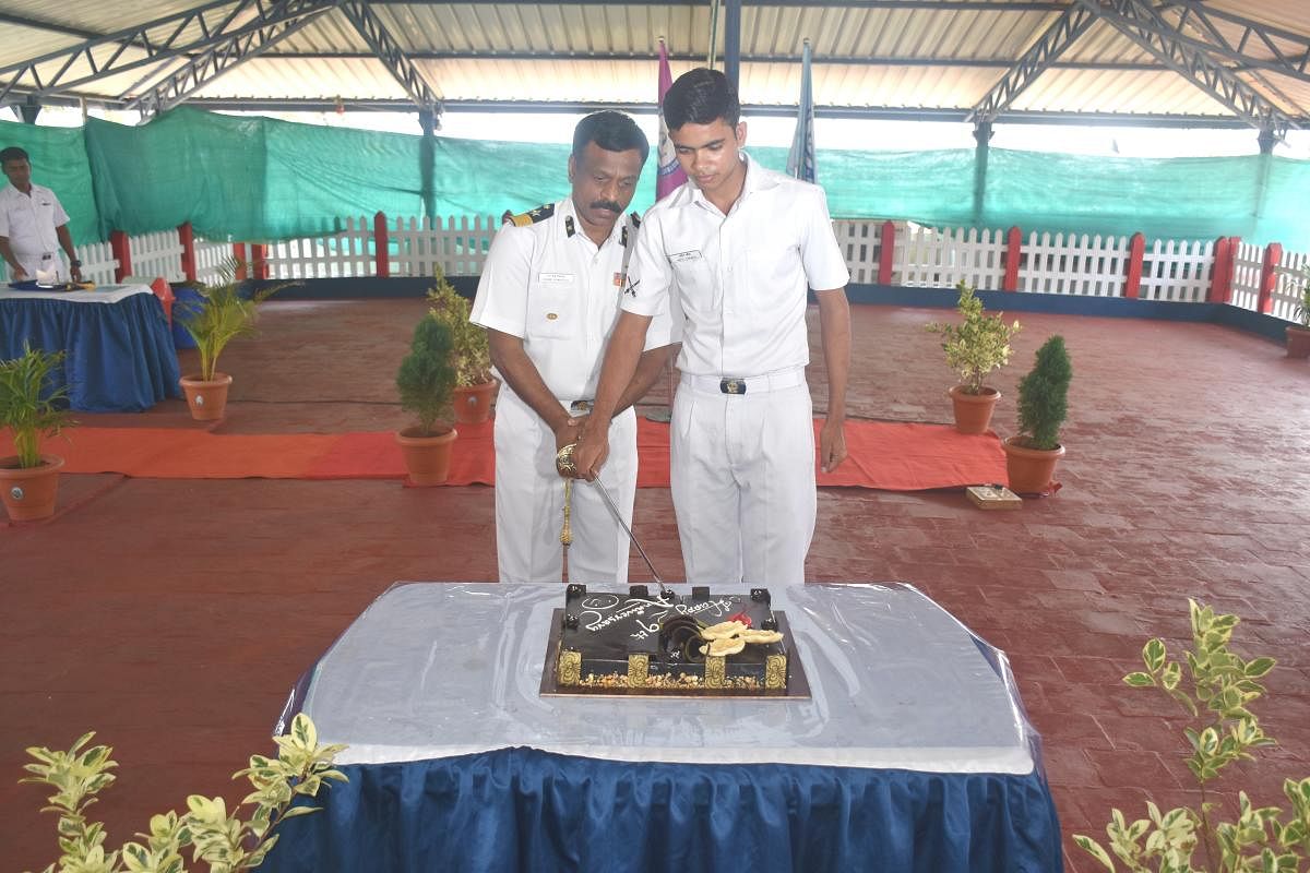 Commander of Coast Guard Headquarters (Karnataka) S B Venkatesh celebrates the Coast Guard Mangalore’s 29th anniversary at the Coast Guard office in Panambur in Mangaluru on Thursday.