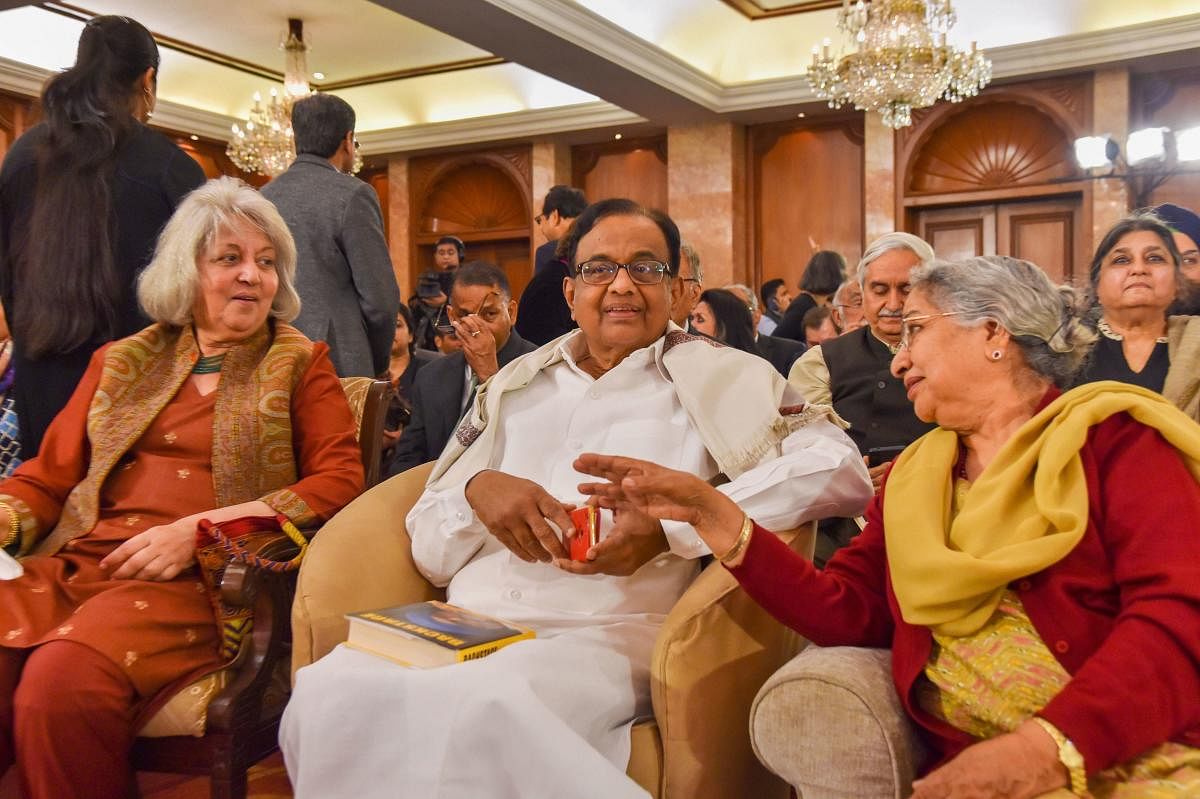 Former finance minister P Chidambaram with former MP Manmohan Singh's wife Gursharan Kaur and Isher Judge Ahluwalia (L) at the launch of deputy chairperson of the erstwhile Planning Commission Montek Singh Ahluwalia's book "Backstage: The Story Behind India’s High Growth Years", at a function in New Delhi. PTI