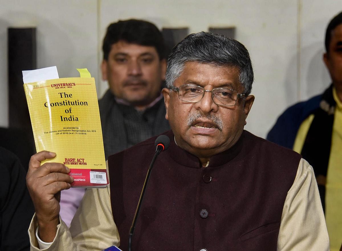 Union Law and IT Minister Ravi Shankar Prasad addresses the media during a press conference on CAA and NRC issue at state BJP office, in Patna. PTI