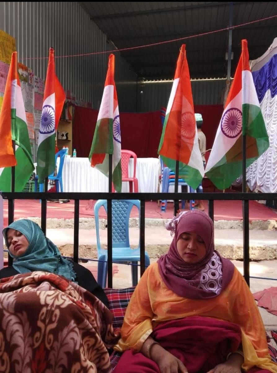 Two Pillanna Garden residents, Amreen (left) and Warsi, on a hunger strike near Tannery Road on Wednesday. Courtesy Saqib Idress 