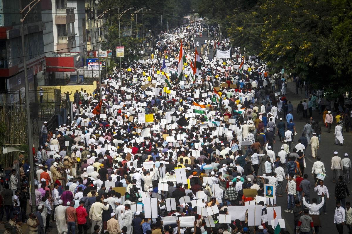 Protestors participate in a rally against a new citizenship law, in Pune. (PTI Photo)