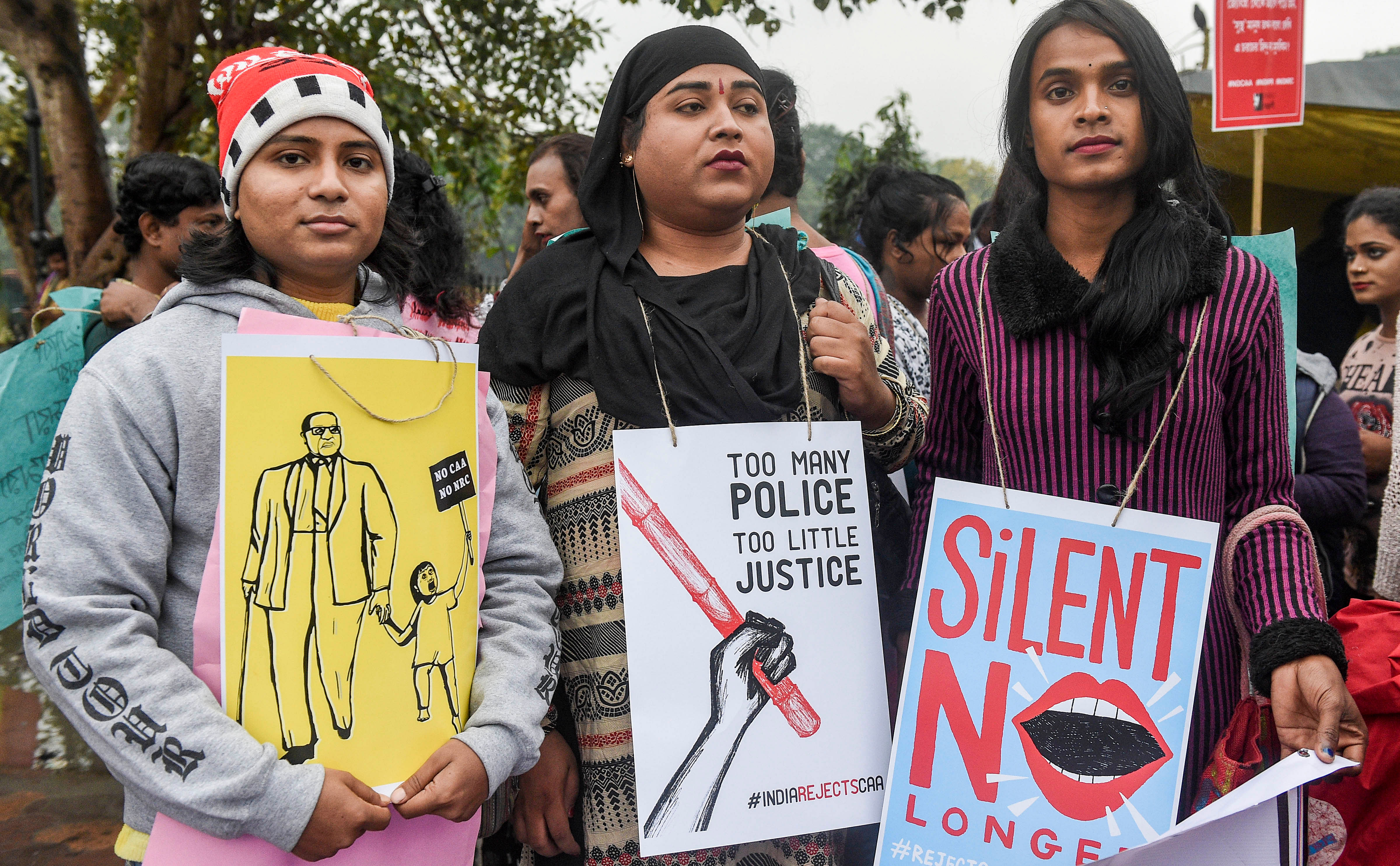 Protestors from transgenders, women and queer communities take part in a protest rally against the amended Citizenship Act, NRC and NPR, in Kolkata. (PTI Photo)