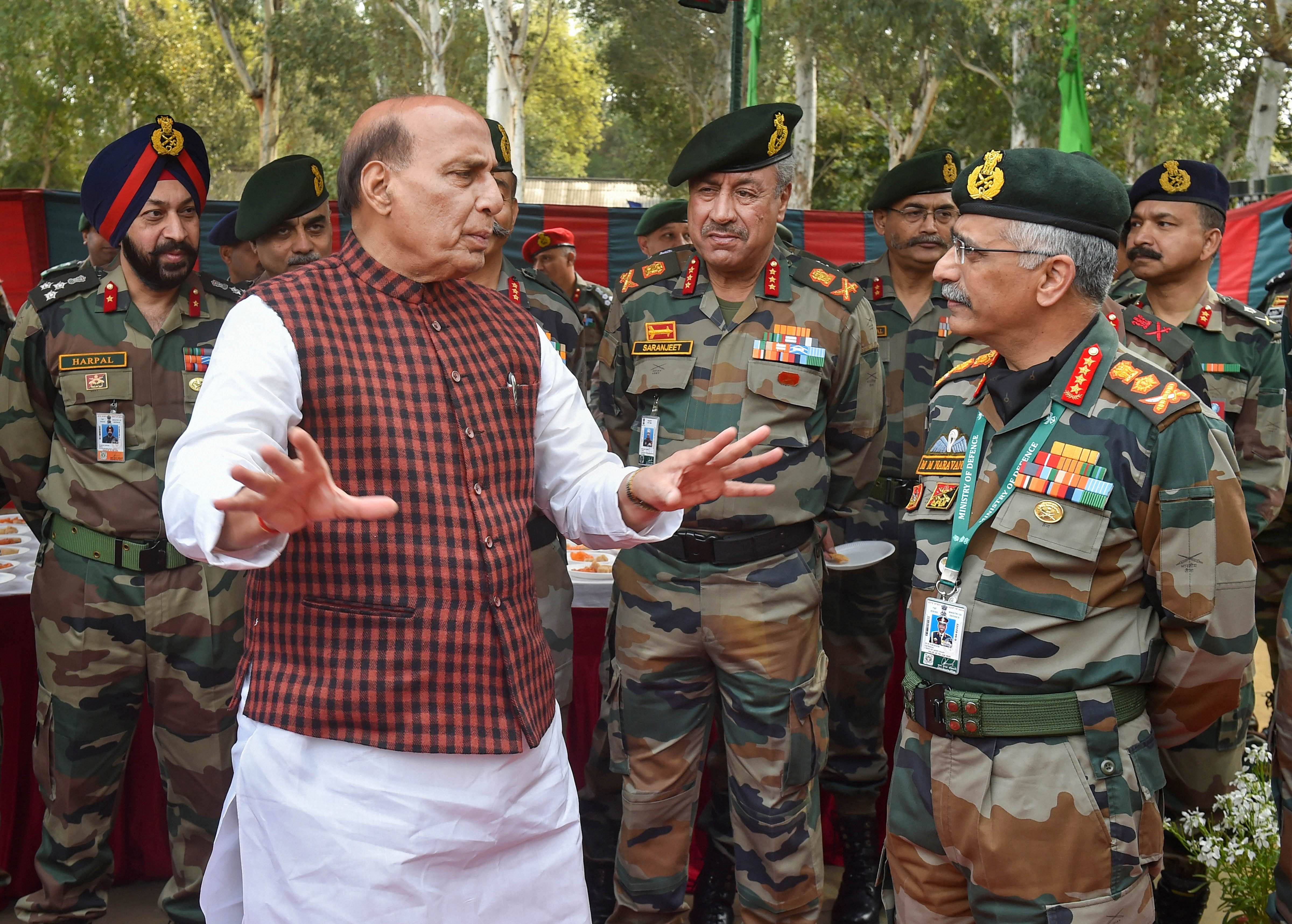 Defence Minister Rajnath Singh interacts with Army Chief General Manoj Mukund Naravane. (PTI Photo)