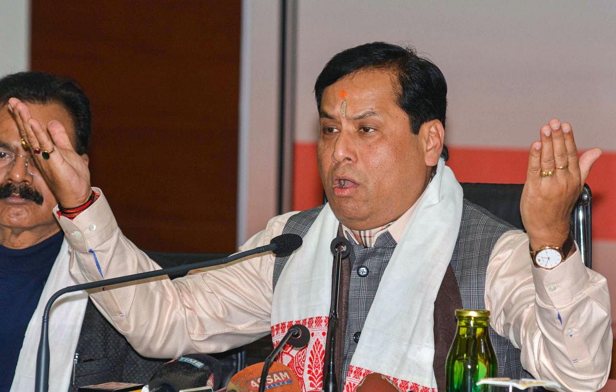 Assam Chief Minister Sarbananda Sonowal addresses a press conference, in Guwahati. PTI