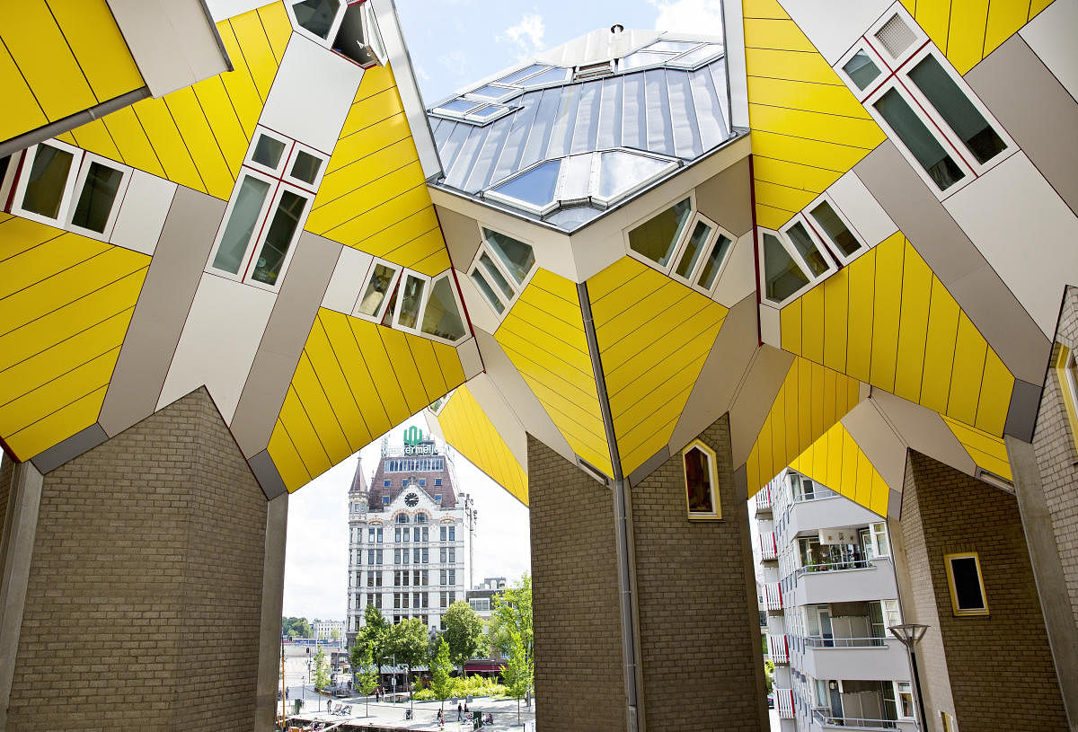 White-and-yellow Cube Houses are an iconic attraction.