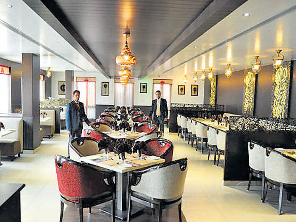 Karnataka currently levies only a 4% VAT on non-AC restaurants and no service tax. Under GST regime, all non-AC restaurants will be taxed at 12% after all the local levies are subsumed under one tax. DH file photo. For representation purpose