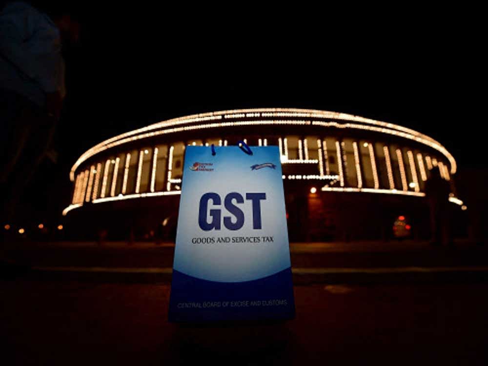 An illuminated Parliament ahead of midinight launch of 'Goods and Services Tax (GST)' in New Delhi on Saturday. PTI Photo