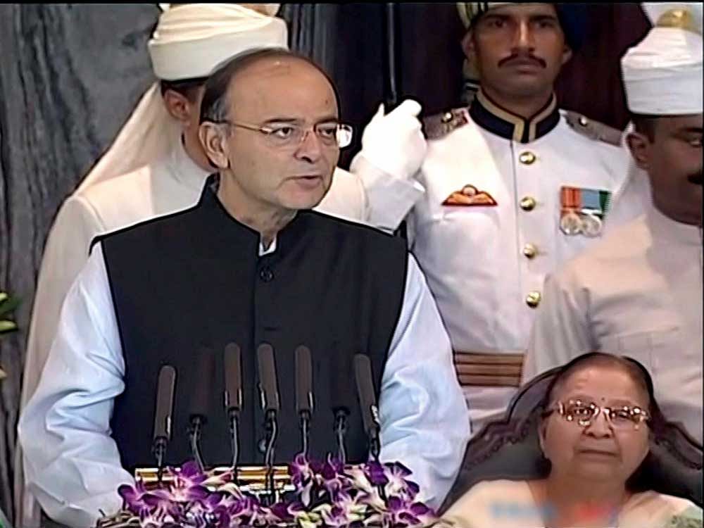 Finance Minister Arun Jaitley addresses the special session of Parliament for the launch of 'Goods and Services Tax (GST)', in New Delhi on Friday. The GST comes into effect after the midnight. PTI Photo