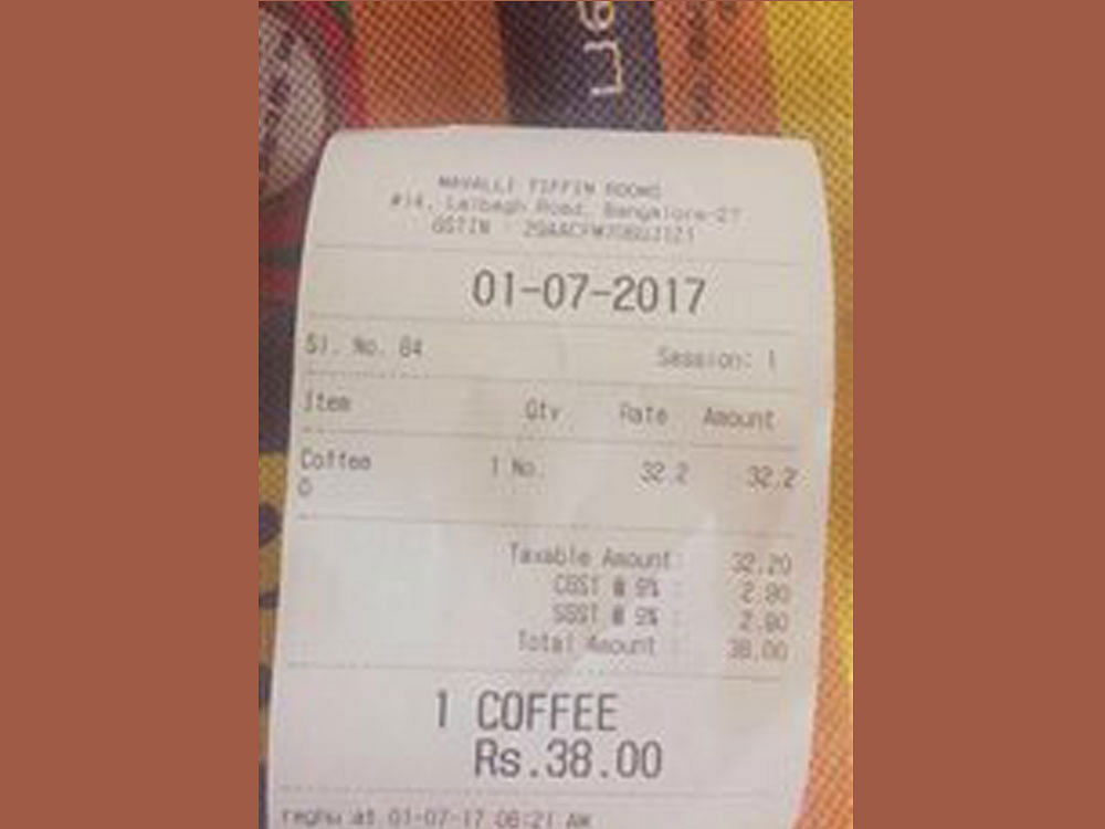 The receipt shows a mild increase in the prices of filter coffee, from Rs. 34 to Rs. 38. Photo credit: WhatsApp.