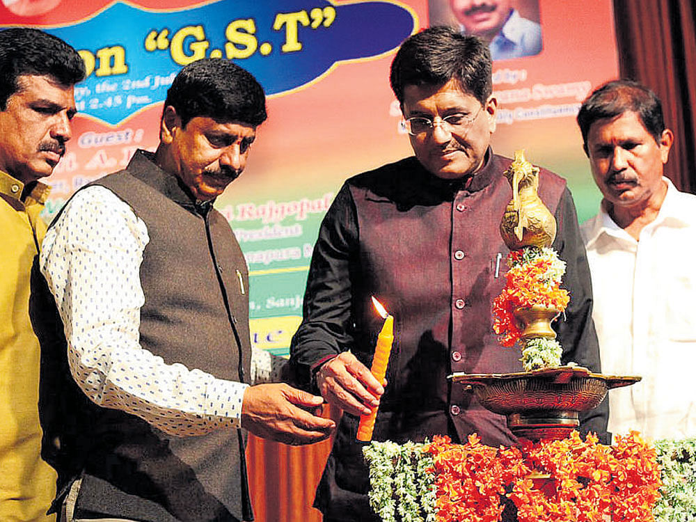 Union Minister for Energy Piyush Goyal inaugurates an interactive session on GST organised by the Byatarayanapura  and Hebbal units of Bharatiya Janata Party (BJP) in  Bengaluru on Sunday. Hebbal MLA Y A Narayanaswamy  and other BJP leaders are seen.