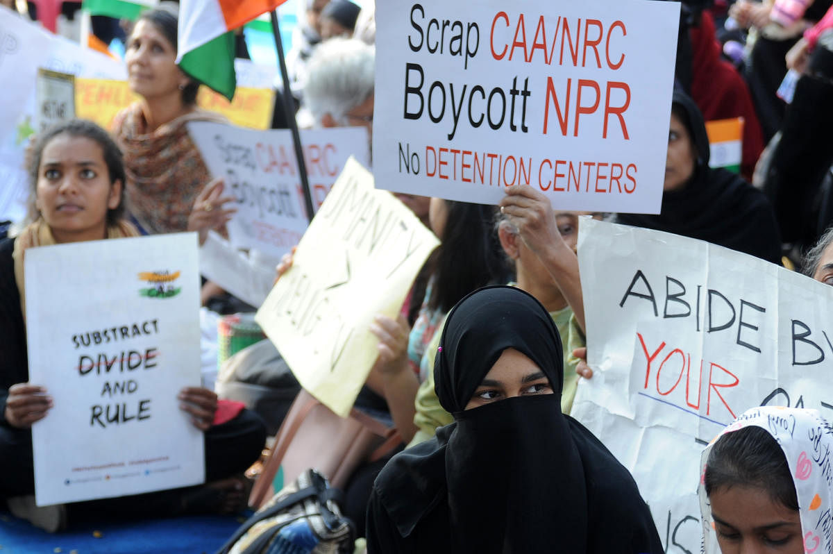 Several women take part in a protest against CAA at MM Road, Frazer Town, Bengaluru on Thursday. | DH Photo: Pushkar V