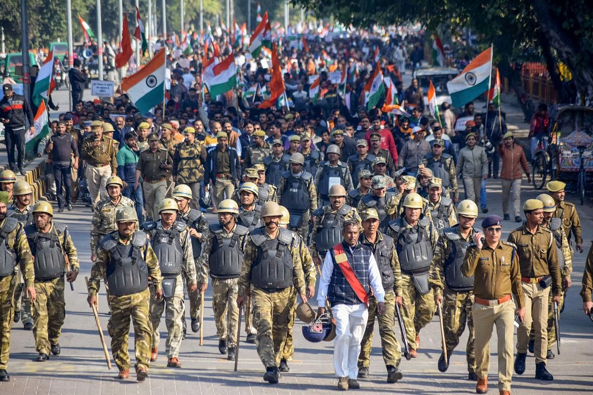 BJP supporters take part in 'Tiranga Yatra' in support of CAA and NRC, in Praygaraj, Saturday, Jan. 11, 2020. (PTI Photo)