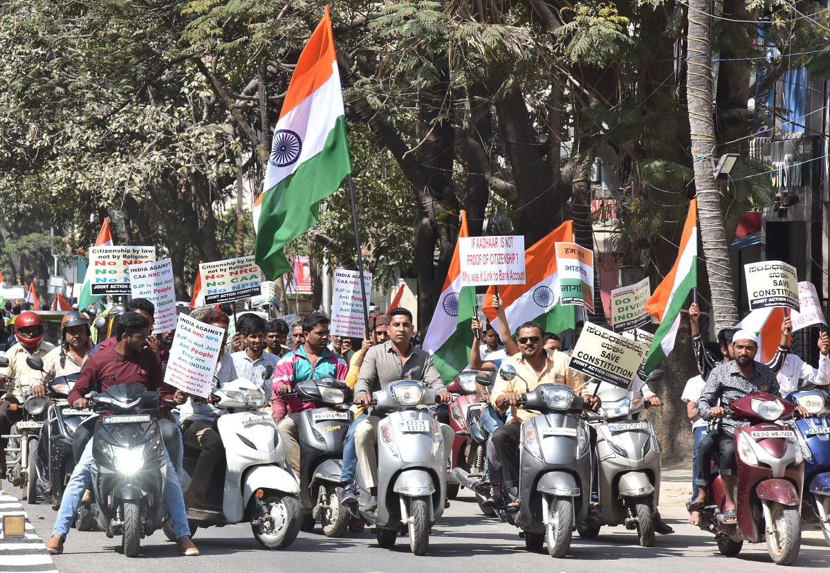 A bike rally against the CAA in Pulakeshinagar on Monday. DH PHOTO/JANARDHAN B K
