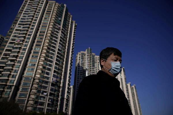A man wearing a mask is seen on a street in Shanghai, China, as the country is hit by an outbreak of the novel coronavirus, February 20, 2020. (Reuters Photo)