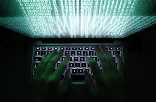 Pakistan-based hackers, who called themselves 'Pakistan Cyber Mafia Hackers', hacked two Gujarat government websites as well as three other websites yesterday and wrote derogatory remarks about Prime Minister Narendra Modi on their home pages.. Reuters File Photo