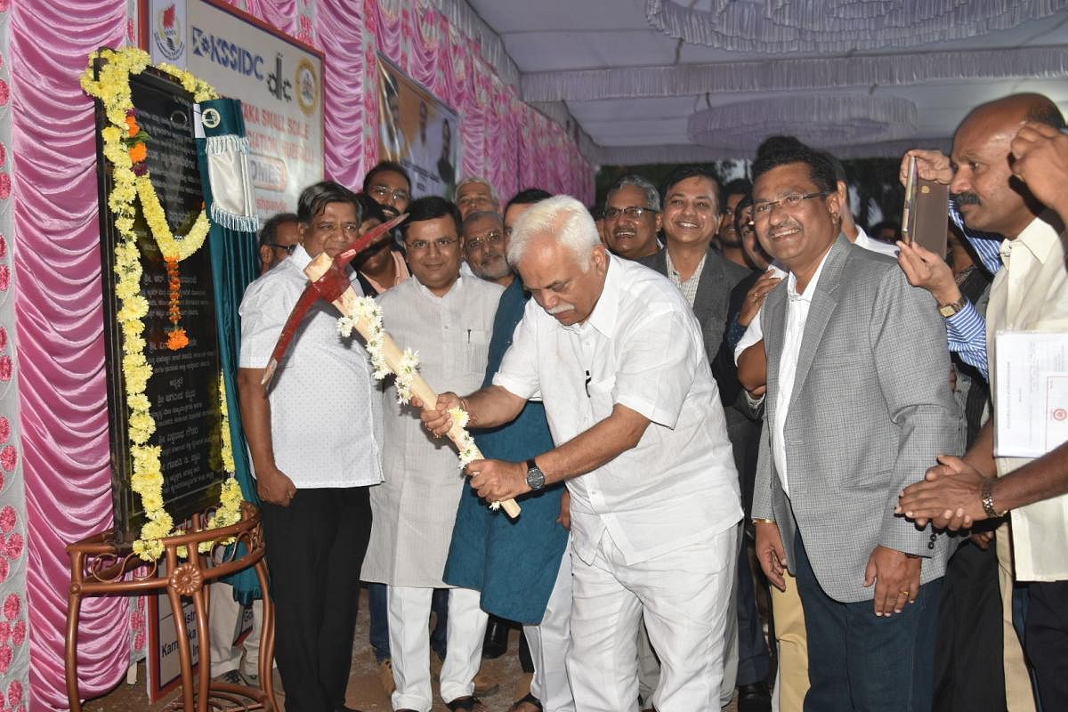 Large &amp; Medium Industries Minister R V Deshpande perform Bhoomi Pooja for underground drainage line laying work at Gokul Road Industrial Estate in Hubballi on Sunday.