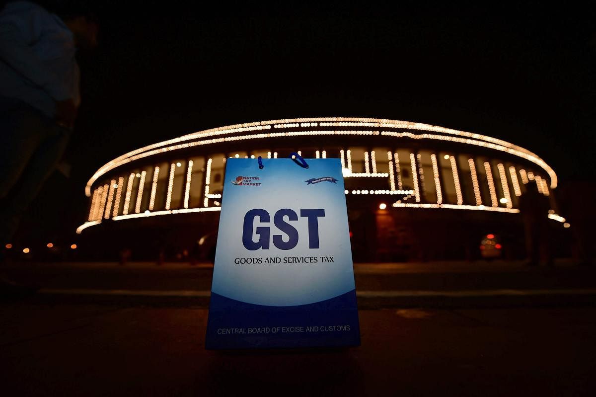 An illuminated Parliament ahead of midinight launch of 'Goods and Services Tax (GST)' in New Delhi on Friday, June 30, 2017. PTI Photo