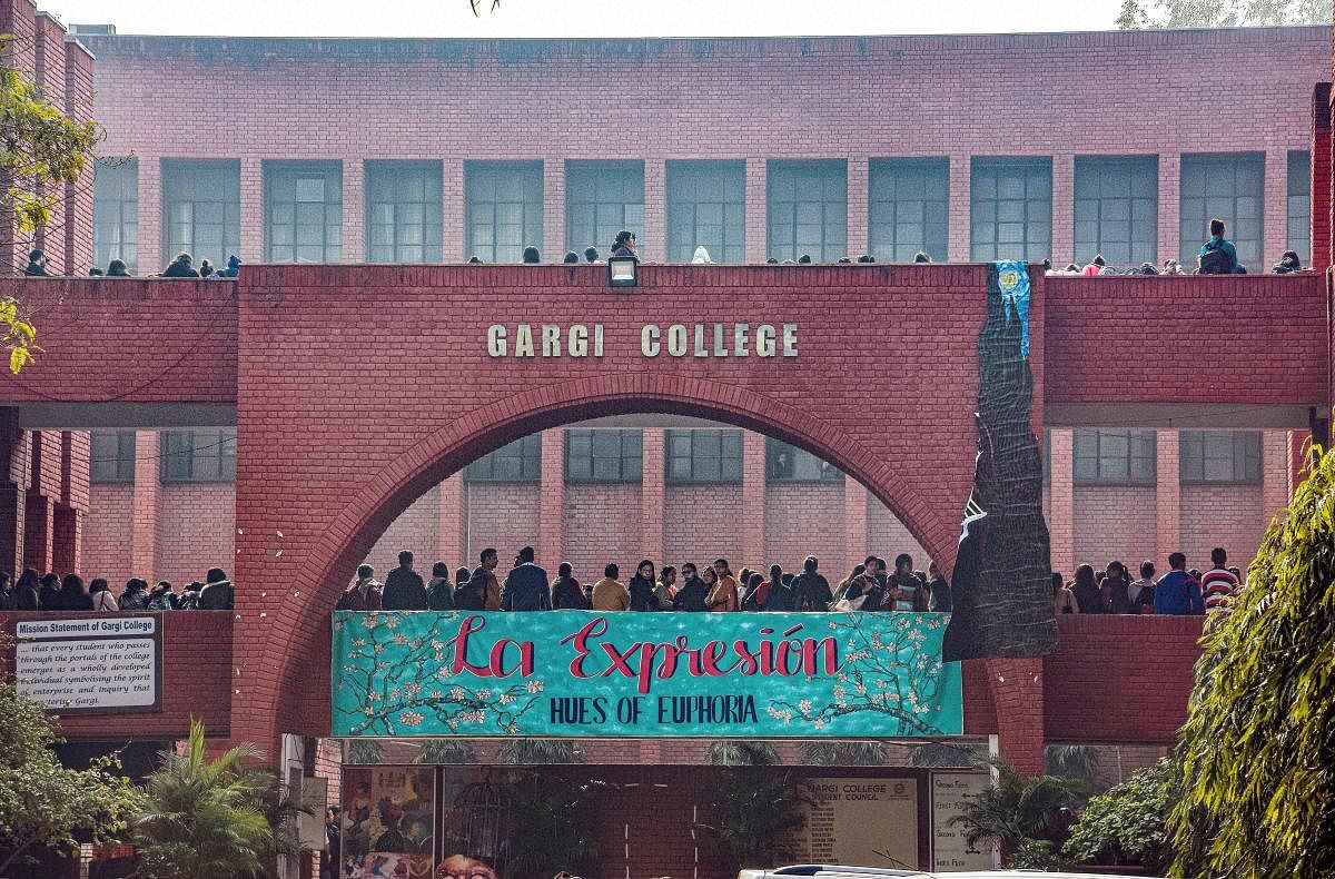 Students stage a protest against the alleged molestation of students by a group of men who had gatecrashed a cultural festival, at Gargi College, in New Delhi, Monday, Feb. 10, 2020. (PTI Photo)