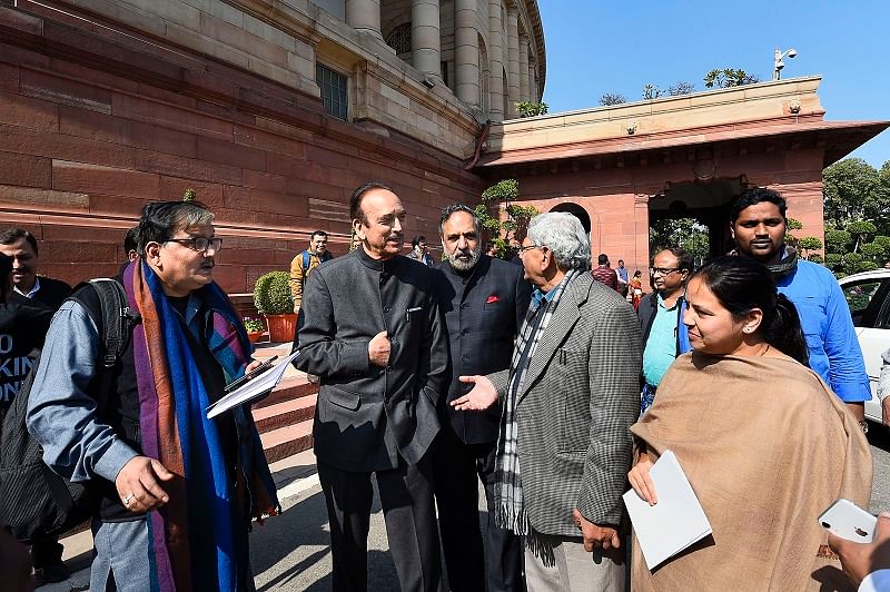 Congress leaders Ghulam Nabi Azad (2nd L) and Anand Sharma (C) with CPI(M) General Secretary Sitaram Yechury and RJD's Manoj Jha (L) and Misa Bharti (R) at Parliament, on the first day of the Budget Session, in New Delhi. (PTI Photo)