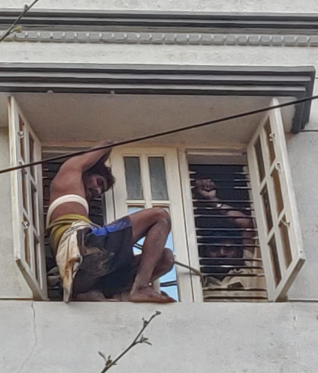 High drama prevailed in the early hours of Saturday as Suhant B (28) clung on to the window crying for help, before firemen rescued him. 