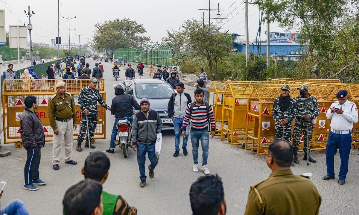 A stretch of the road closed for over two months in Shaheen Bagh due to an anti-citizenship law protest being opened, only to be closed after some time, in New Delhi, Saturday, Feb. 22, 2020. (PTI Photo)