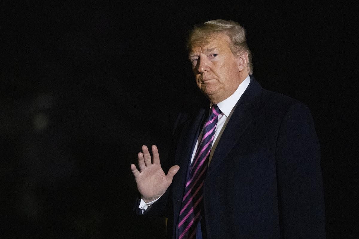 President Donald Trump waves as he arrives at the White House from a campaign trip in Las Vegas, Friday, Feb. 21, 2020, in Washington. (PTI Photo)