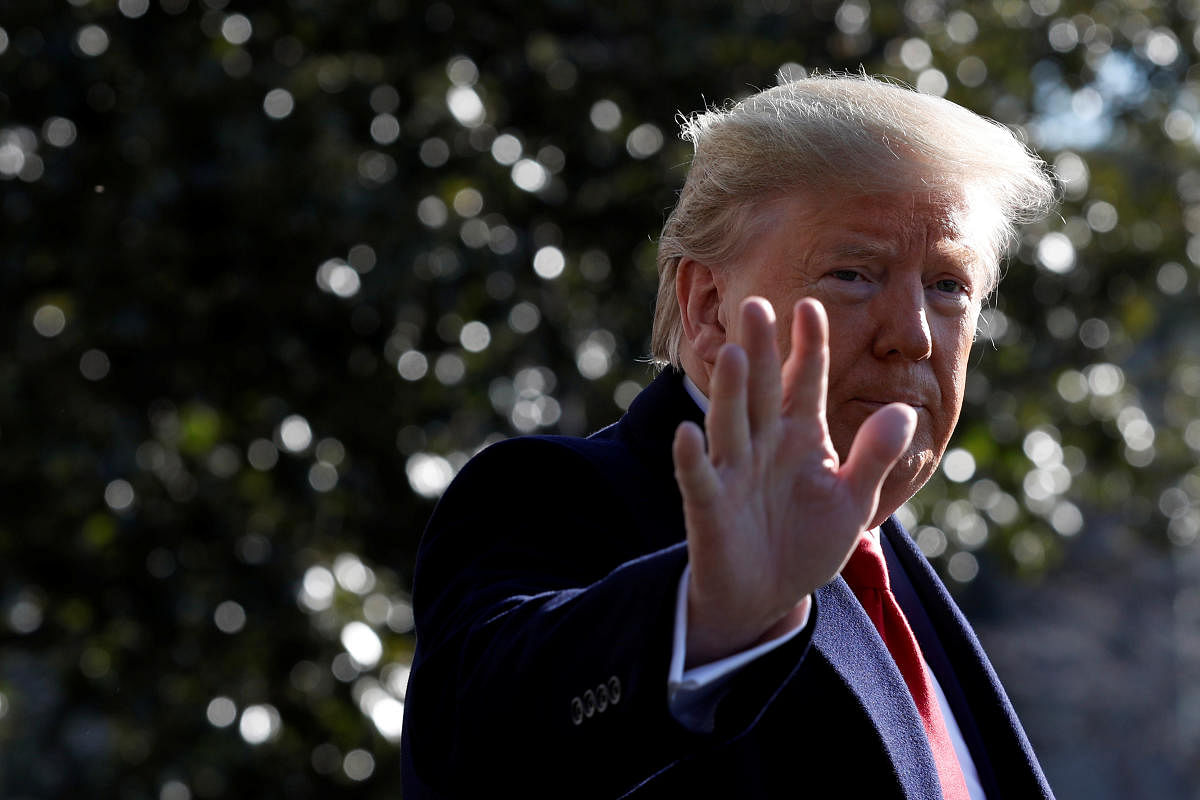 U.S. President Donald Trump waves to the media on the South Lawn of the White House in Washington, U.S., before his departure to India, February 23, 2020. (Reuters photo)