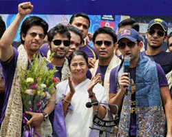 West Bengal Chief Minister Mamata Banerjee with Kolkata Knight Riders owners Shahrukh Khan, Juhi Chawla, skipper Gautam Gambhir and players during a ceremony to felicitate the team in Kolkata on Tuesday. PTI