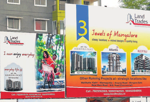A view of advertisement hoardings in Mangalore. DH photo
