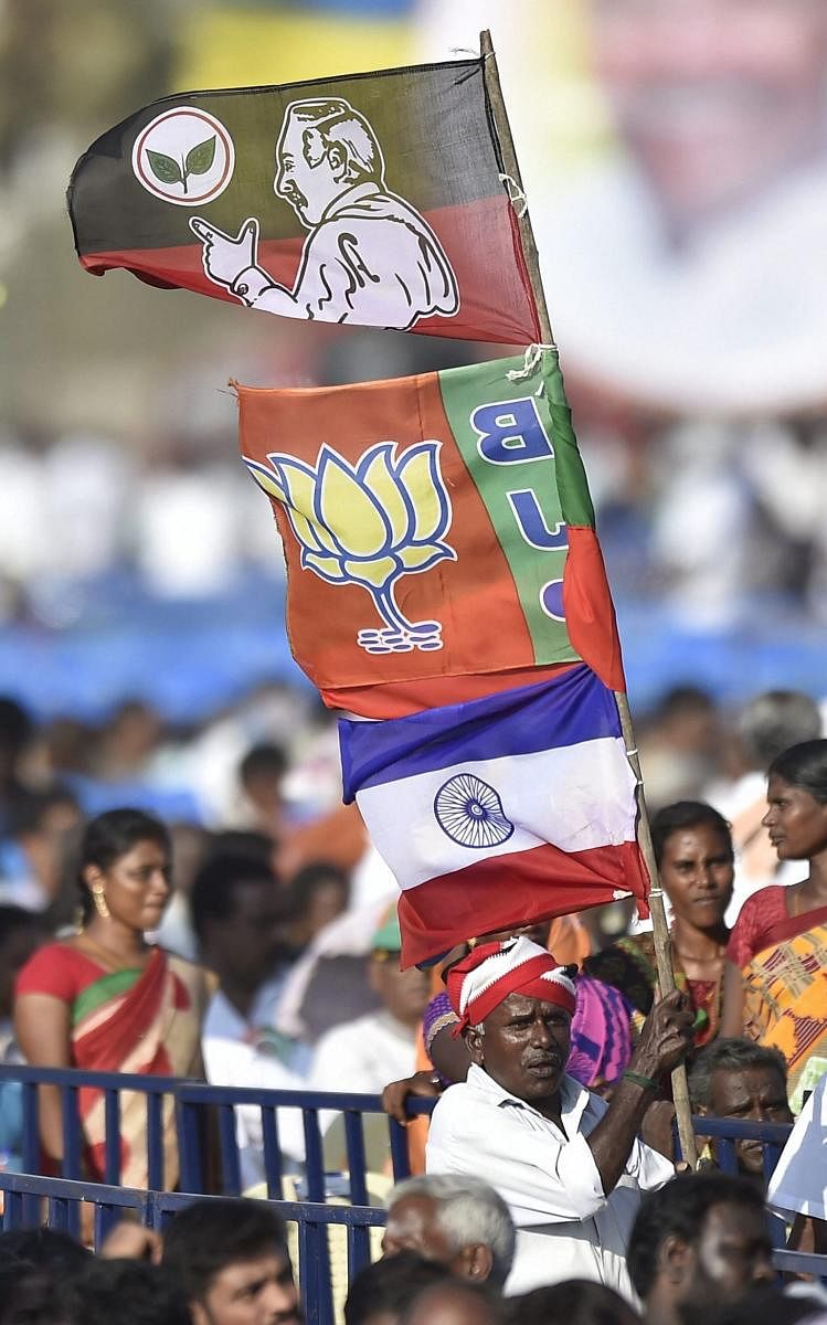 Party workers raise slogans during the BJP-AIADMK-PMK alliance mega rally ahead of the Lok Sabha polls, in Chennai, Wednesday, March 6, 2019. PTI