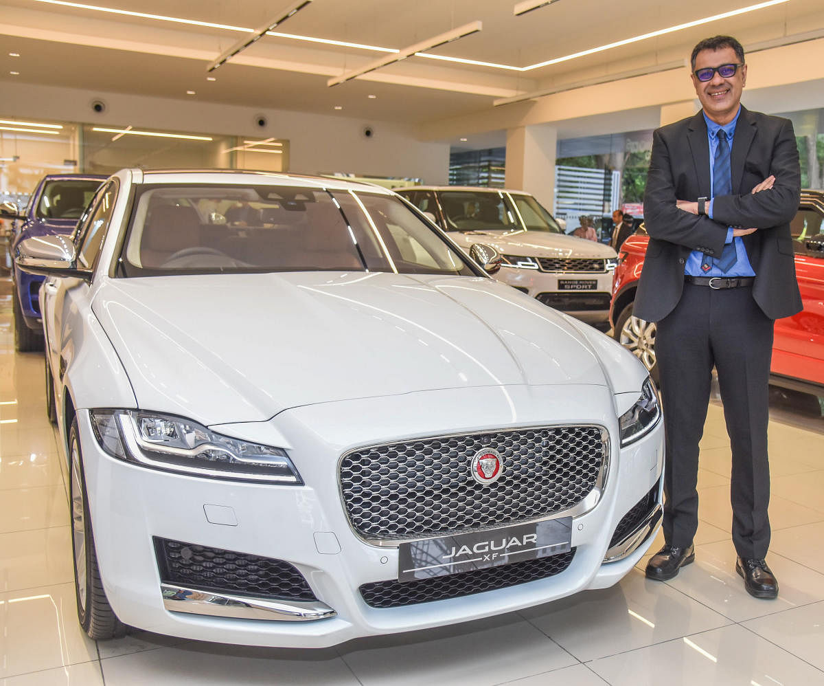 Rohit Suri, President and Managing Director, Jaguar Land Rover India Ltd, is seen with Jaguar Land Rover at Cunningham Road outlet in Bengaluru. DH Photo by S K Dinesh