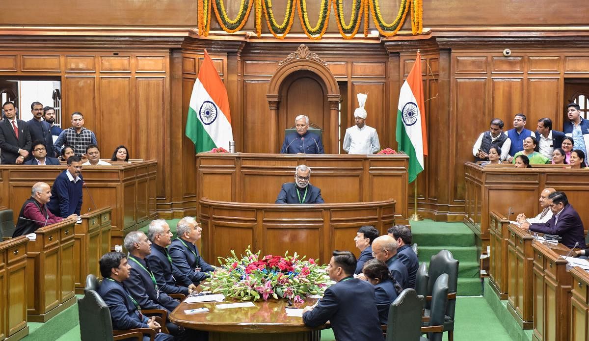 Delhi Chief Minister Arvind Kejriwal speaks as Delhi Deputy CM Manish Sisodia looks on during the first day of the three-day Delhi Assembly session, in New Delhi, Monday, Feb. 24, 2020. This is the first Assembly session after the Aam Aadmi Party (AAP) formed the government for the third time. (PTI Photo)