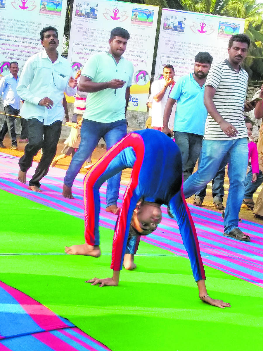 Tanushree Pithrody, 10, in action during 100-metre ‘Chakrasana' race at Udyavara.