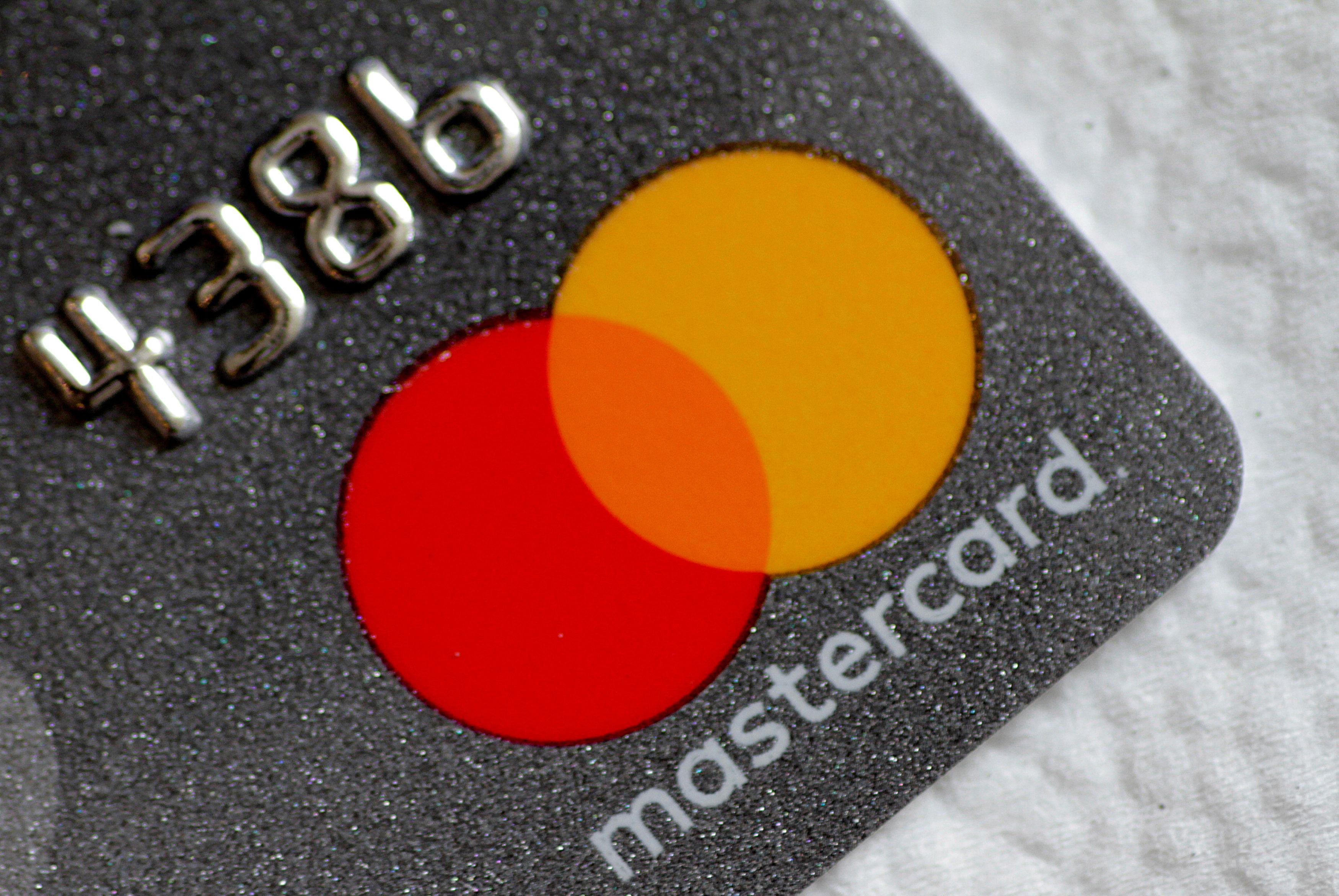 A Mastercard logo is seen on a credit card in this picture illustration. (Reuters Photo)