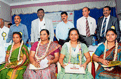 Department of Health and Family felicitates doctors during World Tuberculosis Day in Mysore, on Sunday. dh photo