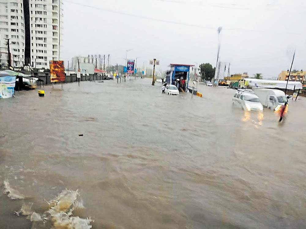 Rajkot received about 440 mm of rain from2.30 am to 5.30 pm on Saturday. DH PHOTO
