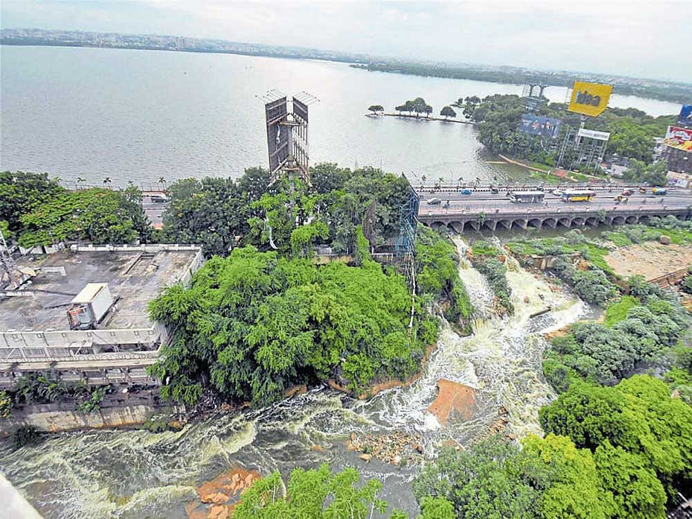 RAINY TUESDAY: The Hussain sagar Lake overflows in Hyderabad