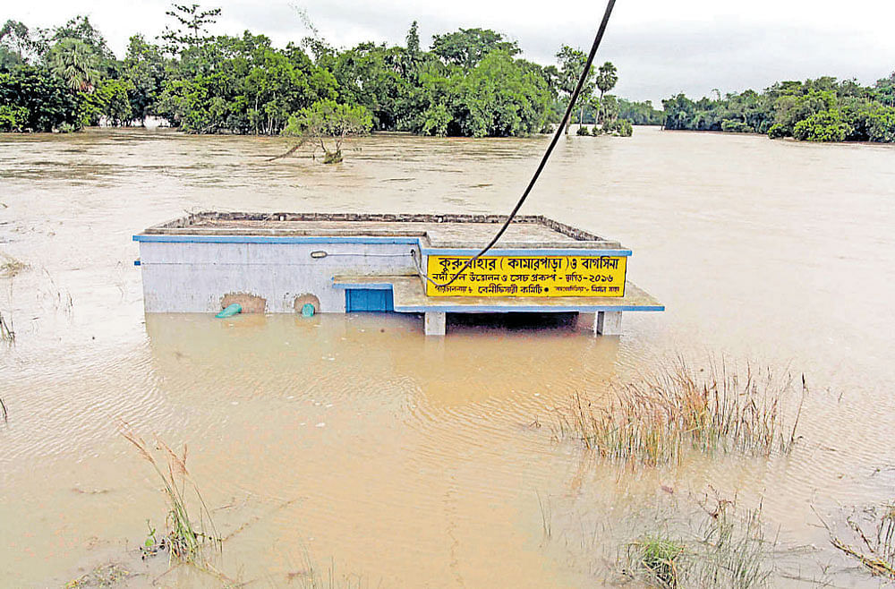 A submerged office in the flood-hit Kurnahar village in Birbhum district of West-Bengal on Wednesday. PTI&AFP.