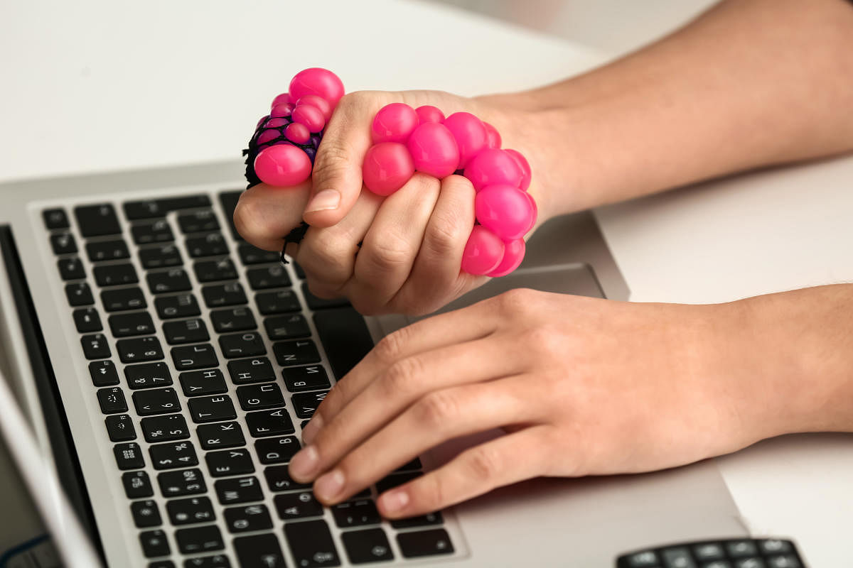Squeezing a stress ball can help to channelise restlessness and focus on a task that needs immediate attention.