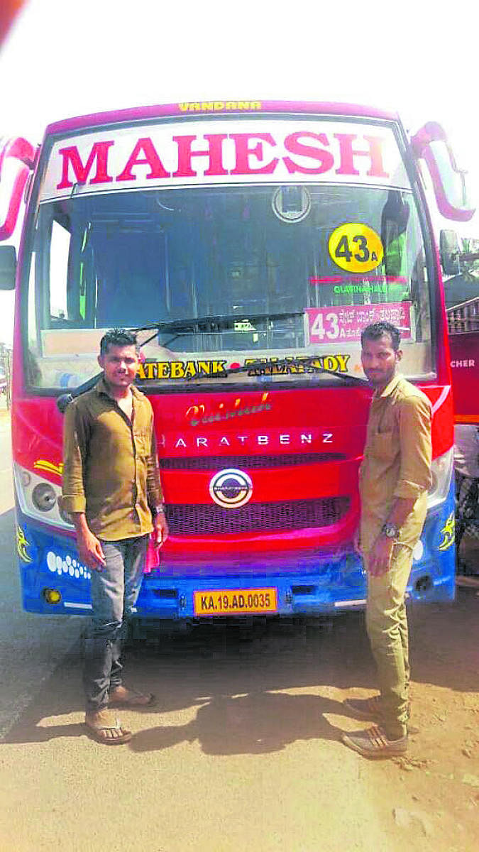 Bus driver Pramod and conductor Ashwith.