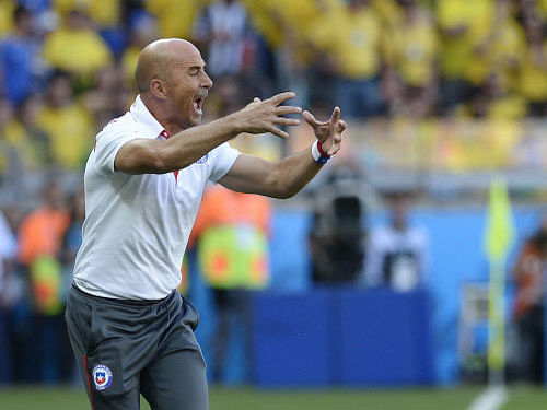 Chile coach Jorge Sampaoli expressed pride at his team's performance despite seeing them exit the World Cup after an agonising defeat on penalties to Brazil. AP photo