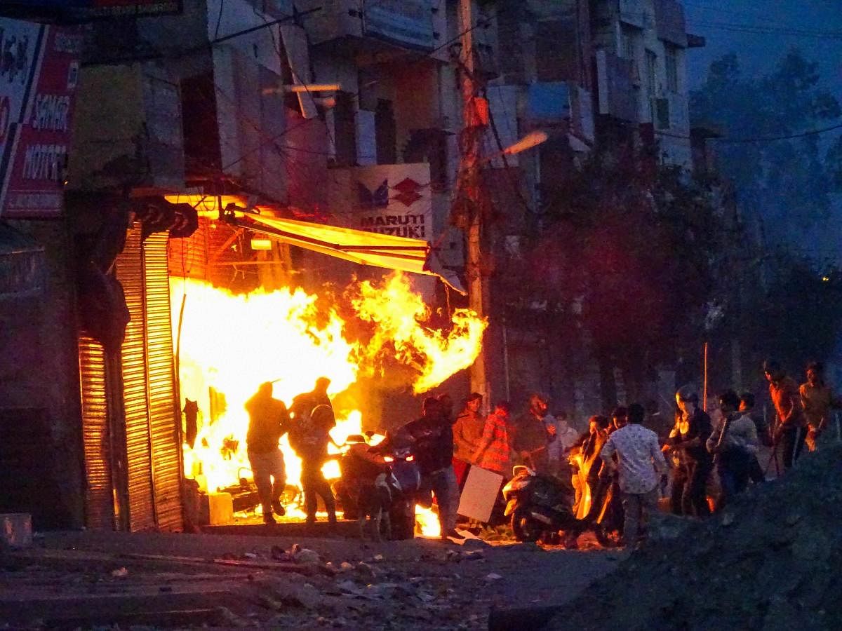 Delhi Police spokesperson Mandeep Singh Randhawa said the situation in northeast Delhi is under control, even as several parts of the area continued to reel under violence. Credit: PTI Photo