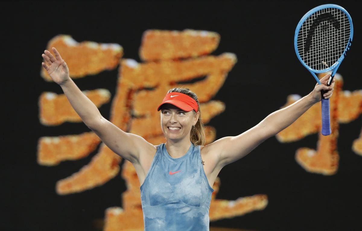 Russia's Maria Sharapova celebrates after winning the match against Denmark's Caroline Wozniacki. (REUTERS Photo)