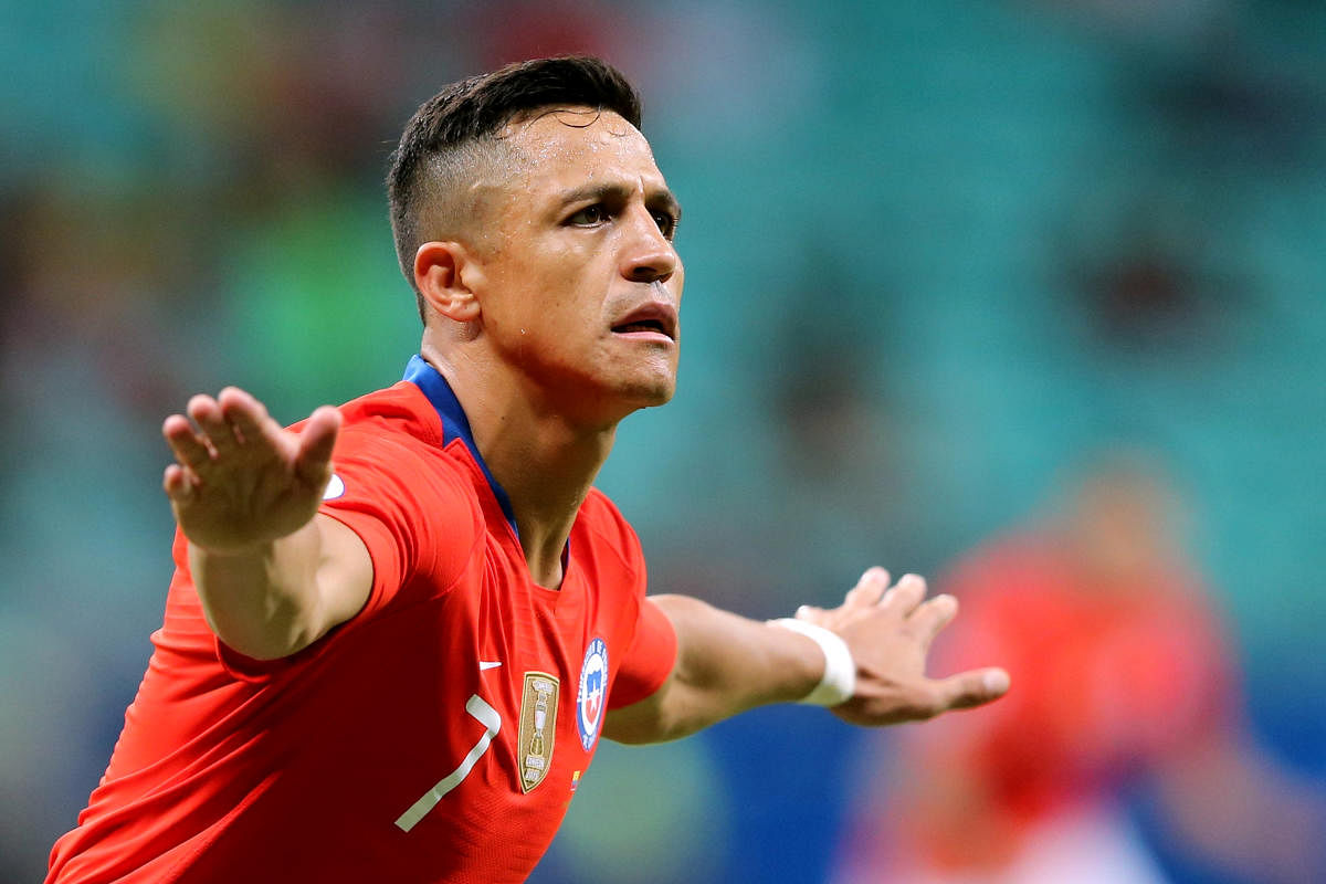 Chile's Alexis Sanchez celebrates scoring their second goal. (REUTERS)