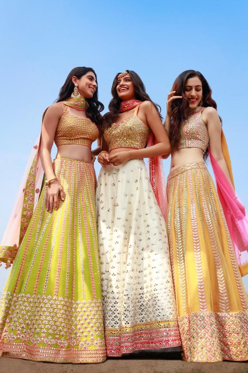 Sunny yellow, lime green and off-white are some colours brides can optfor. (Above) From Jiya by Veer Designs.